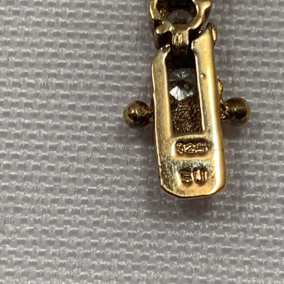 Goldtone Tennis bracelet with lobster clasp all stones intact.   925 SU - Picture 7 of 7